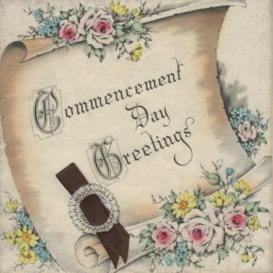 open paper scroll surrounded by flowers