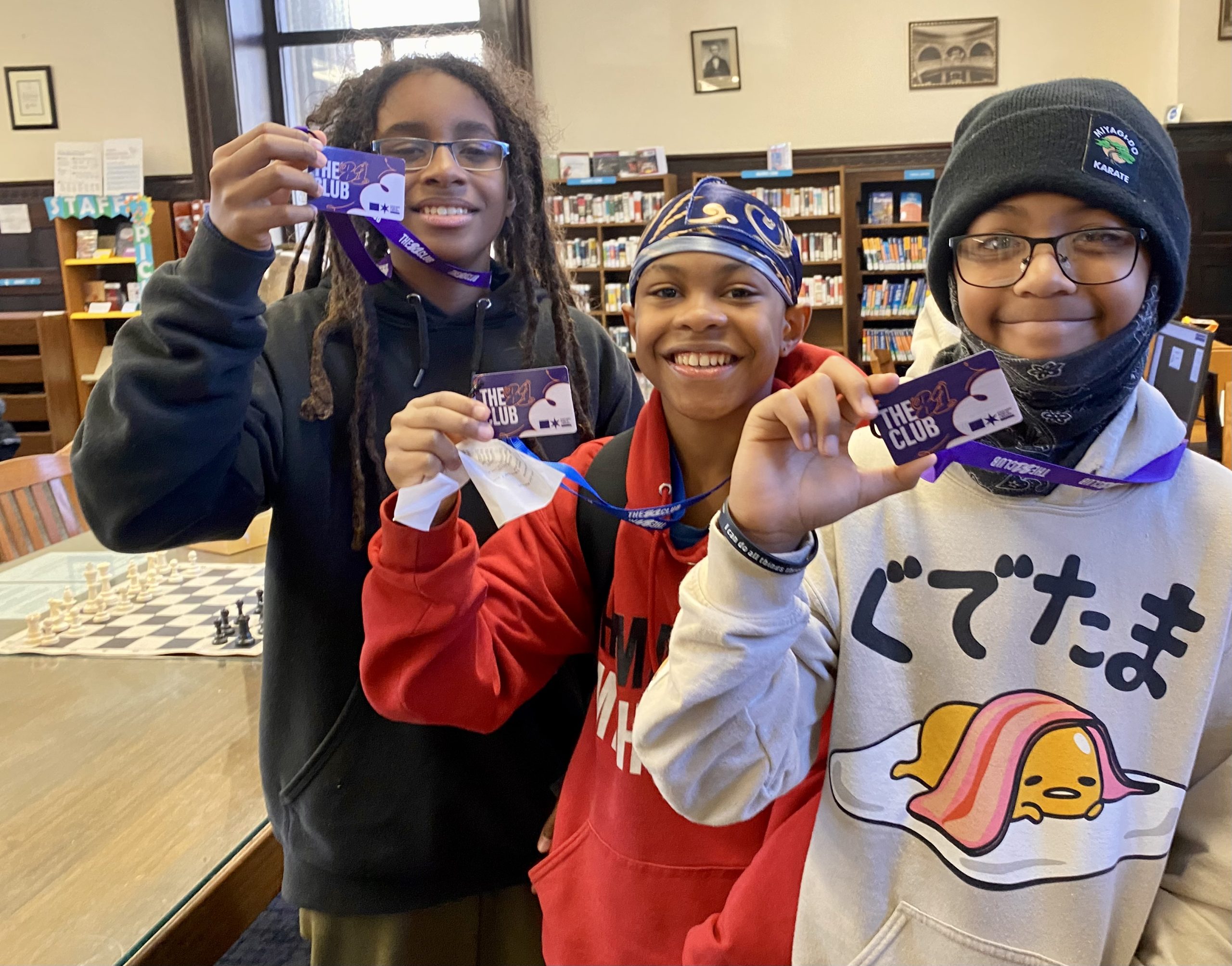 CPS students showing off their new 81 Club cards. 2022. Kids with their 81 Club cards