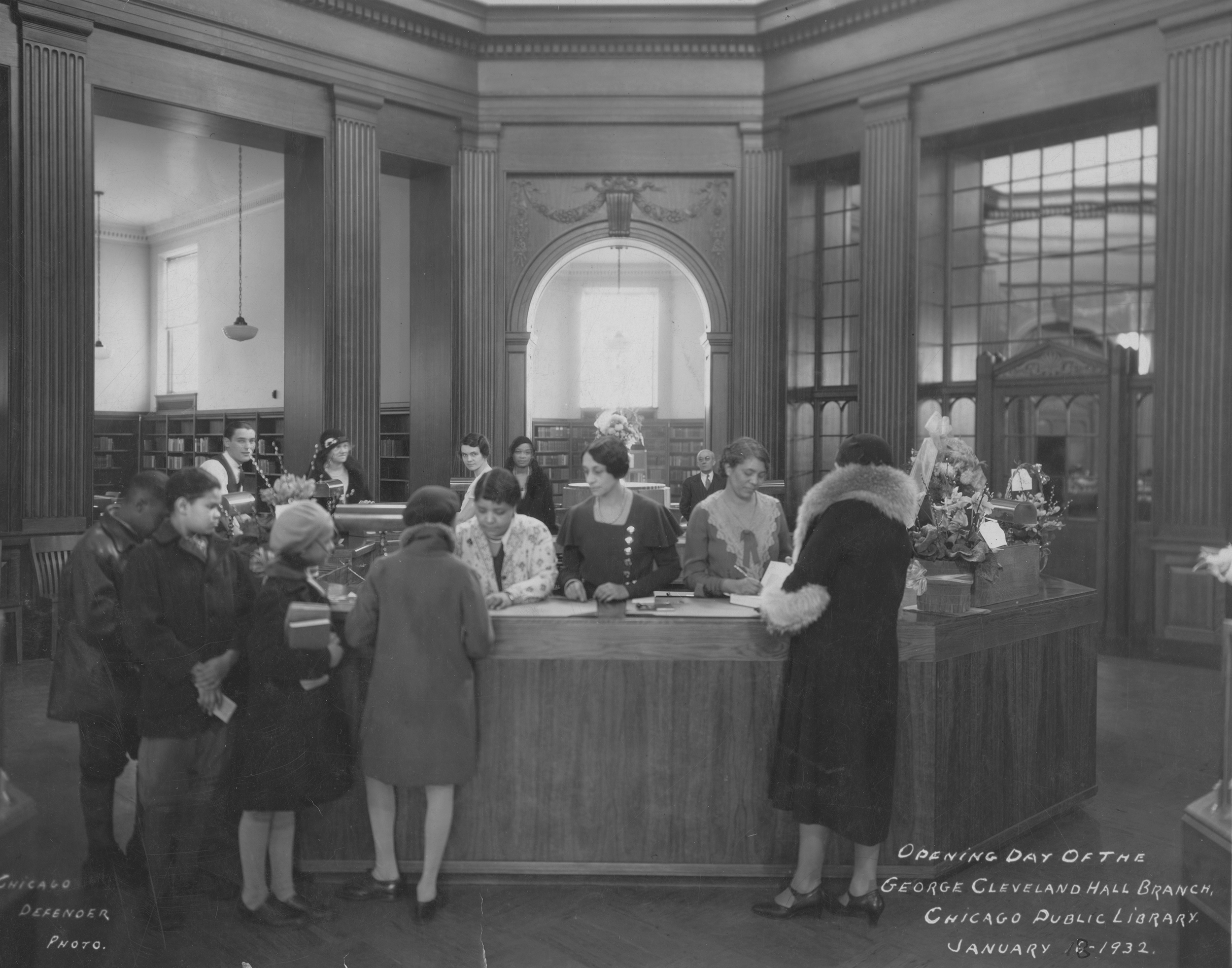 Staff helping patrons at Cleveland Hall Branch