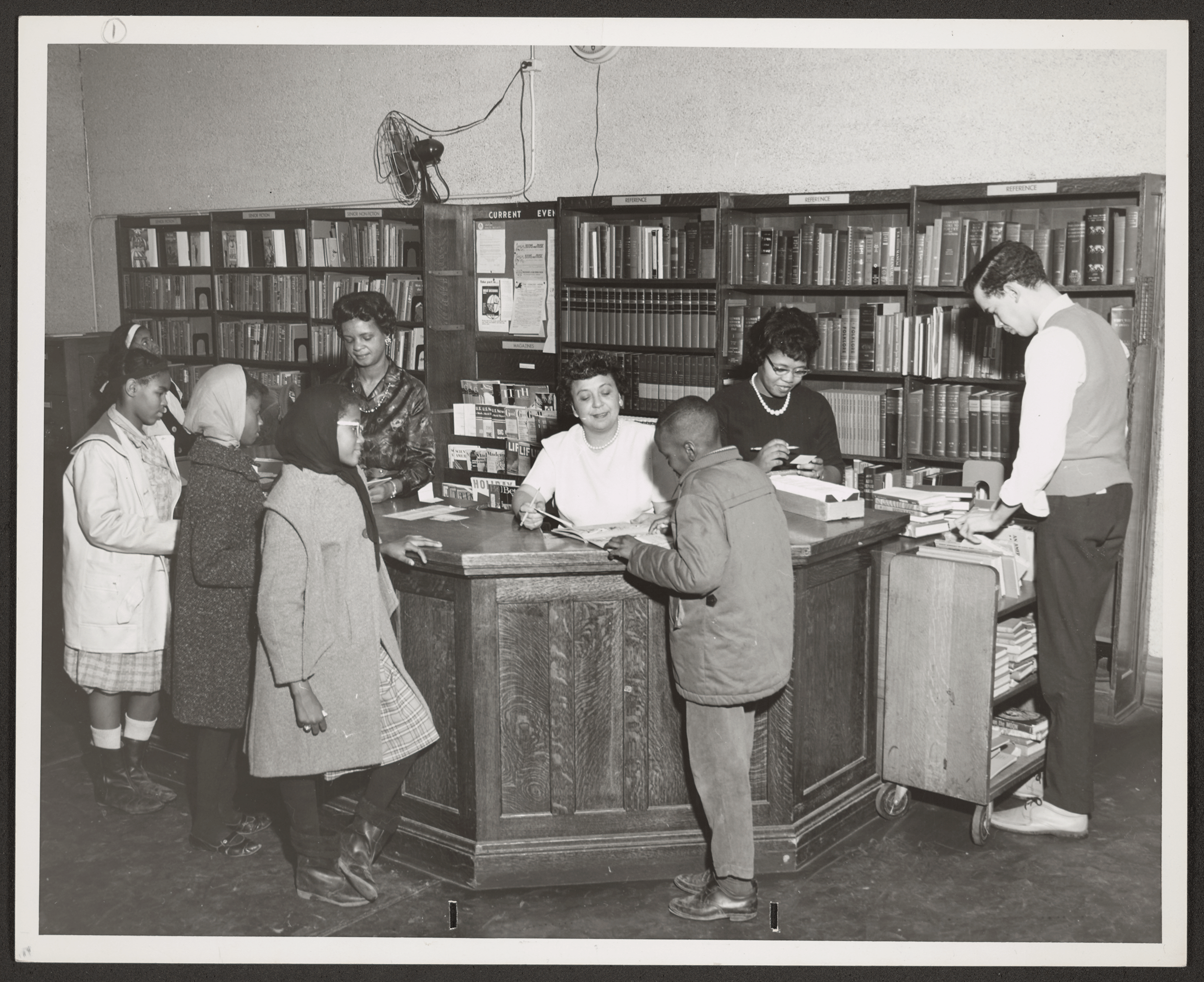 CPL staff helping patrons